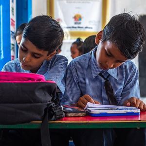 top schools in-bangalore Bangalore Scottish School students sitting on chair